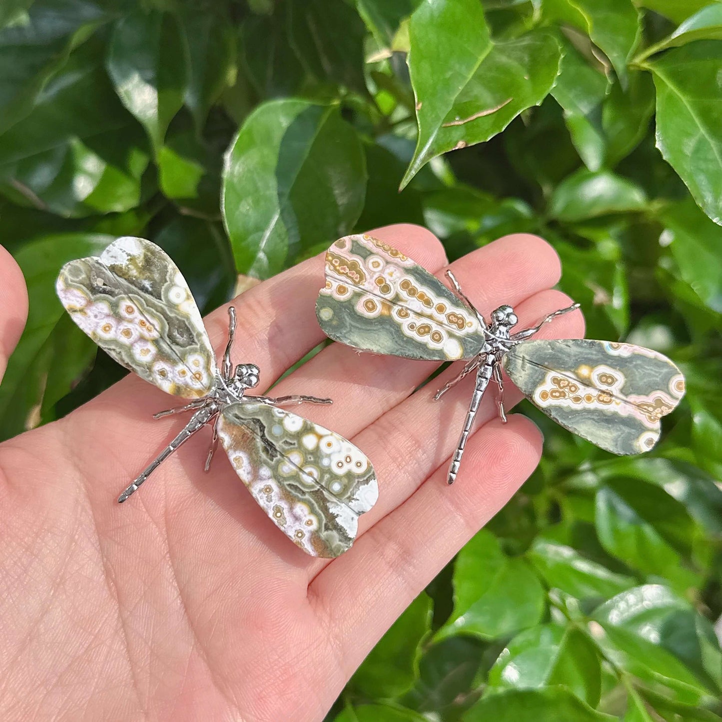 Handcrafted ocean jasper dragonfly with metallic wings and natural patterns, ideal for collectors.