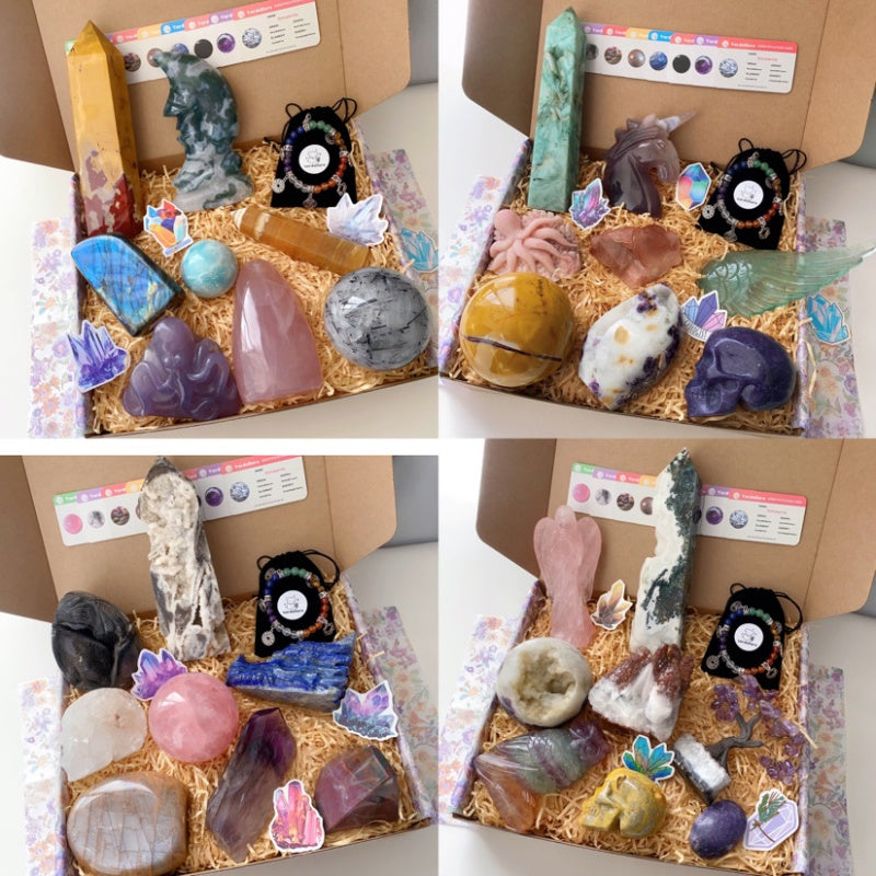 Crystal mystery box featuring towers, polished stones, skull carvings, crystal dragons, and handmade bracelets.