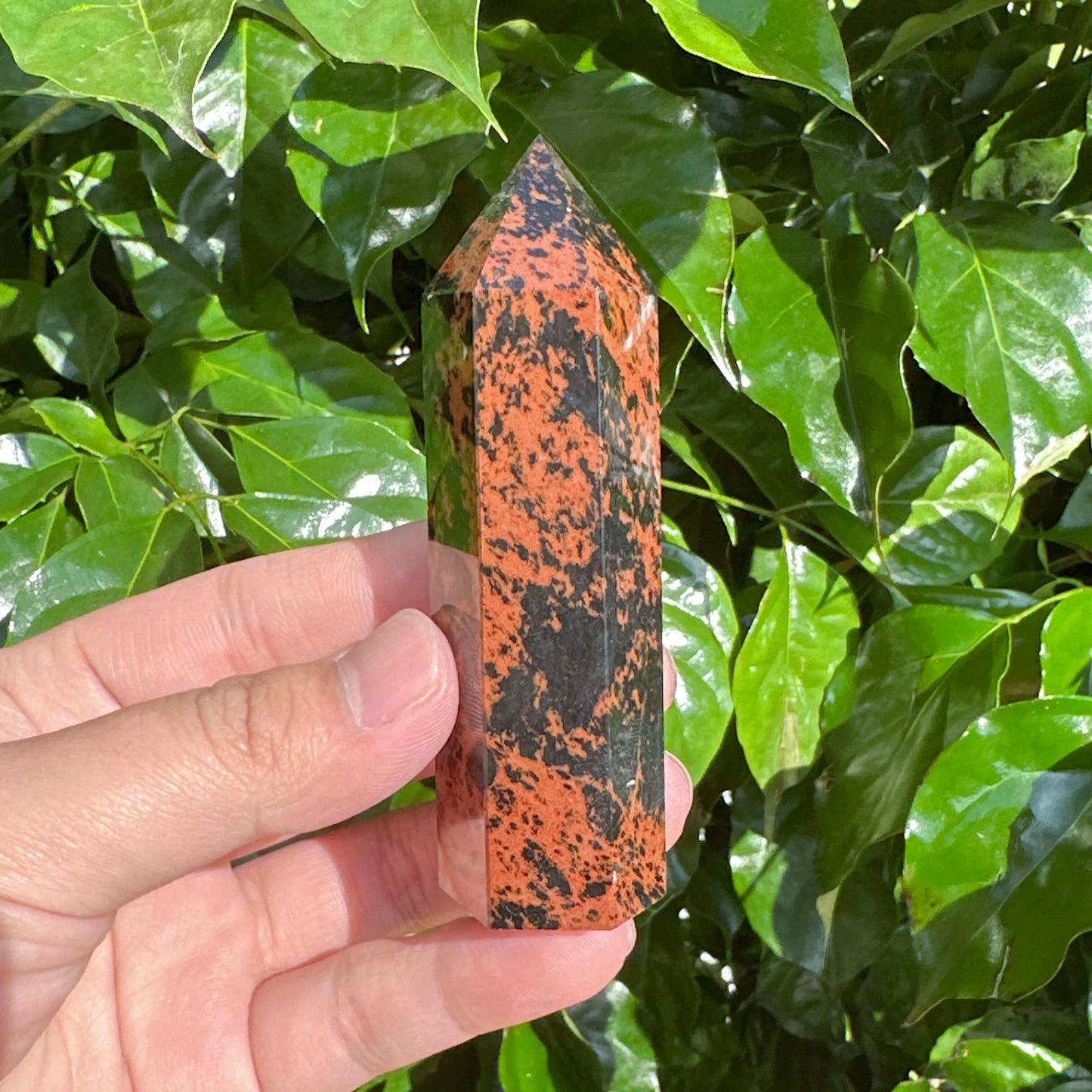 Mahogany Obsidian Tower with a polished surface, known for its grounding properties and stunning visual appeal.