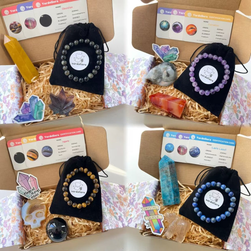 Surprise crystal box containing natural gemstone bracelets, towers, animal carvings, spheres, and mineral ID guides.