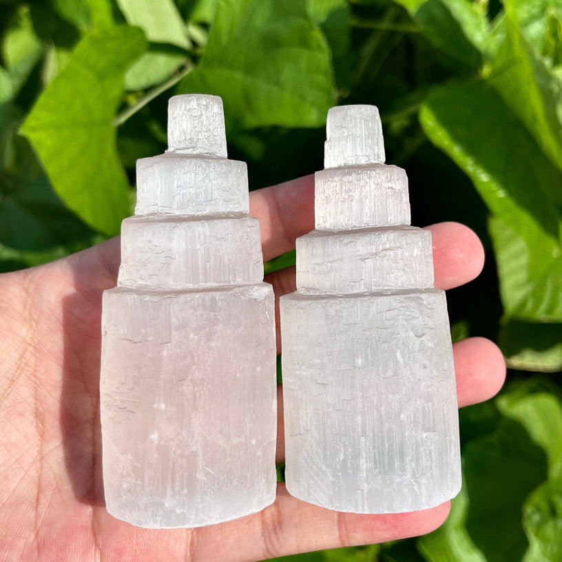 Selenite crystal tower in multi-tiered pyramid design