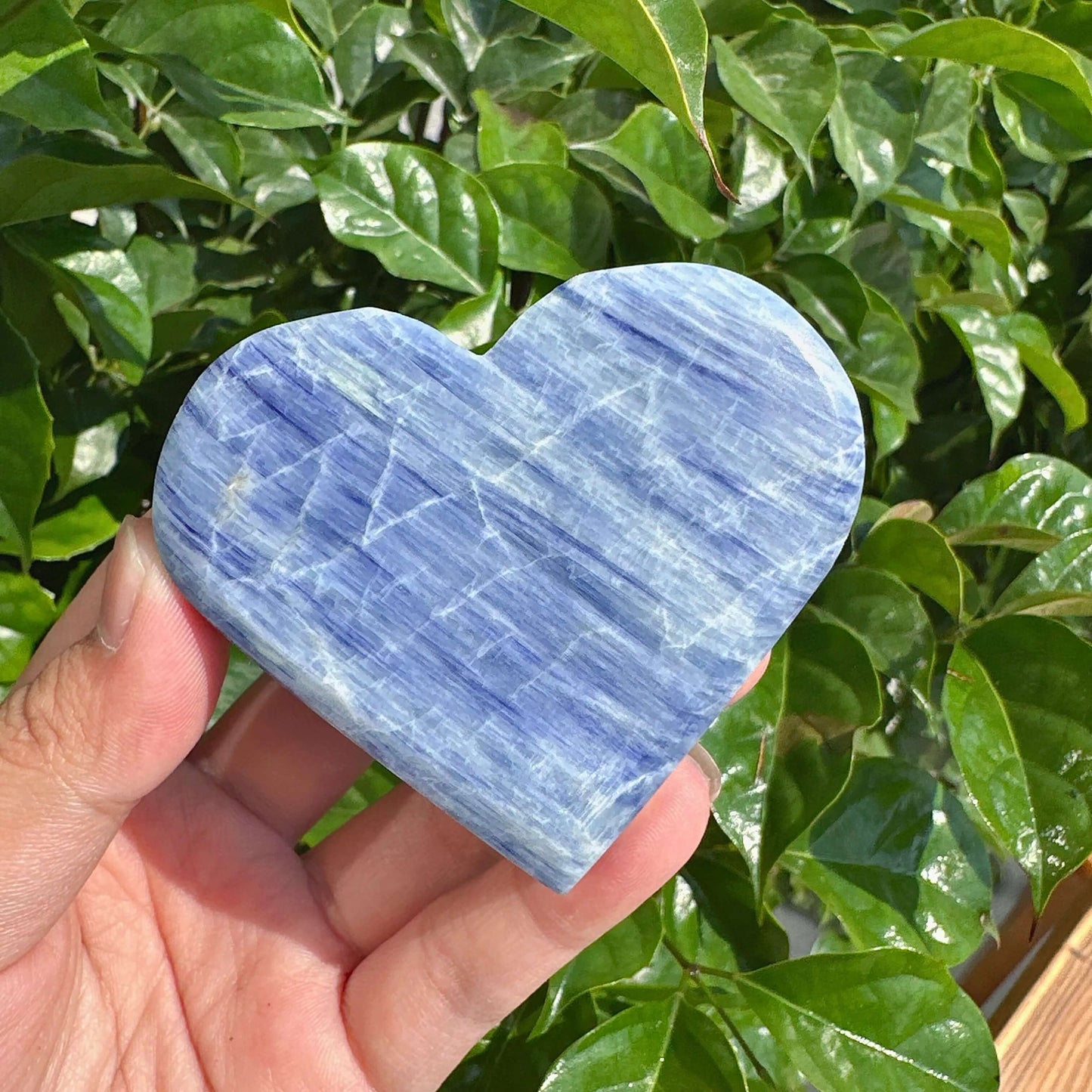 Handcrafted Blue Kyanite Heart crystal, showcasing natural blue hues and unique mineral formations.