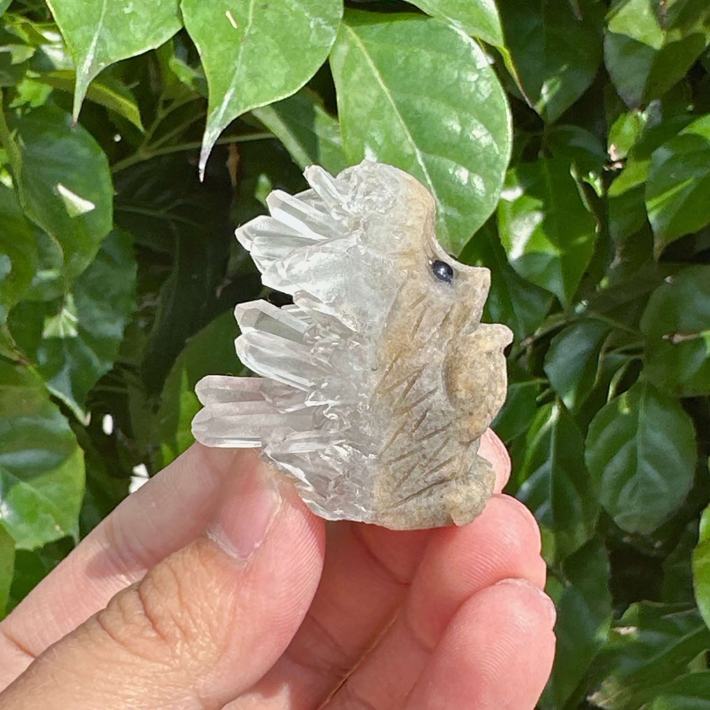 Close-up of Clear Quartz Cluster Hedgehog Carving featuring detailed fur and crystal spikes