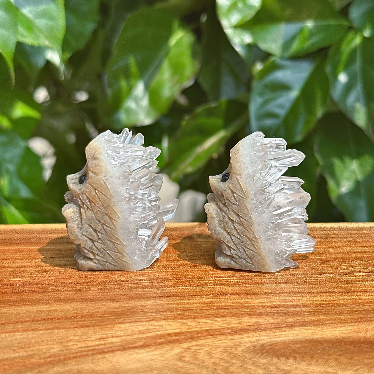 Detailed view of Clear Quartz Cluster Hedgehog Carving with natural quartz crystal formations on the back