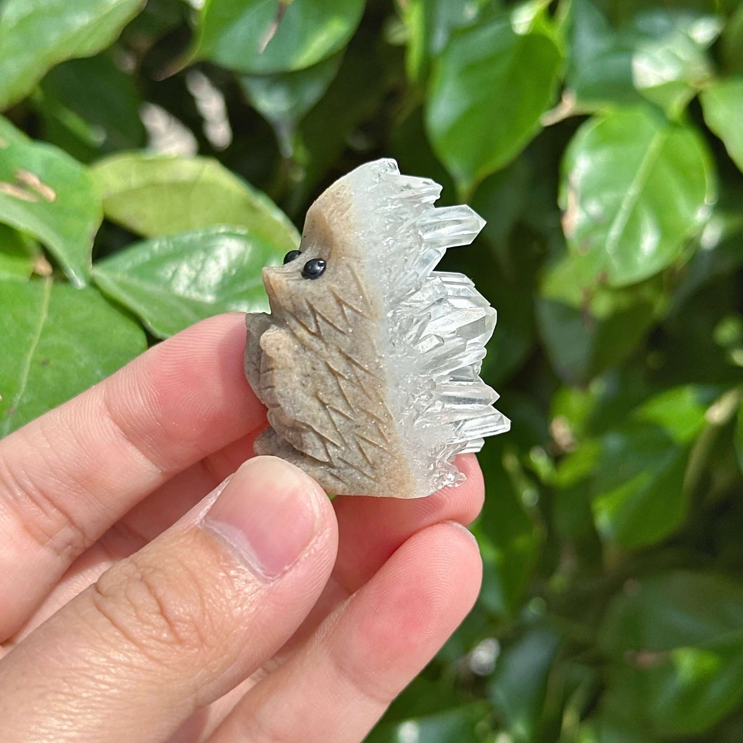 Beautiful Clear Quartz Cluster Hedgehog Carving, showcasing crystal spikes and intricate detailing on the figurine