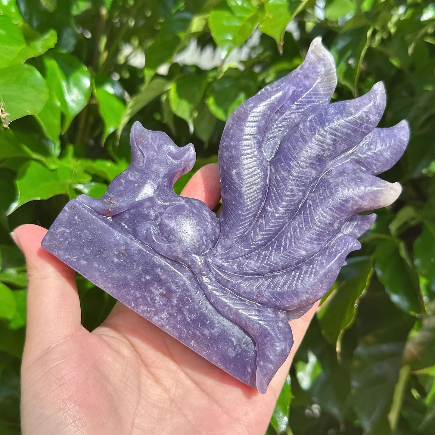 High-quality Lepidolite Nine-Tailed Fox Carving with a focus on the fox's expressive form and details.