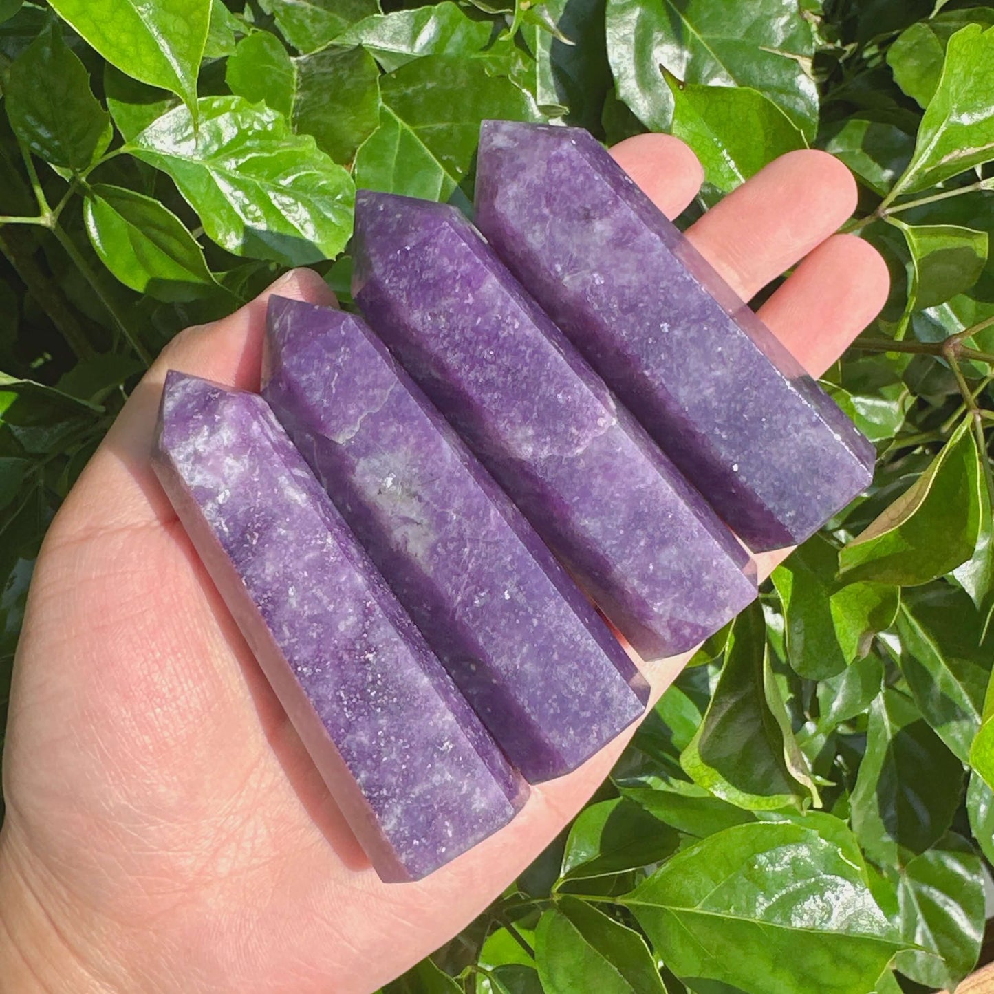 Lepidolite Tower with vibrant purple shades and smooth polished surfaces, perfect for meditation or home decor.