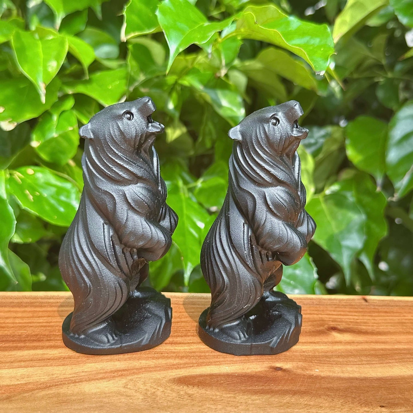 Side view of the Obsidian Capibara statue, emphasizing the smooth, polished lines and intricate design.