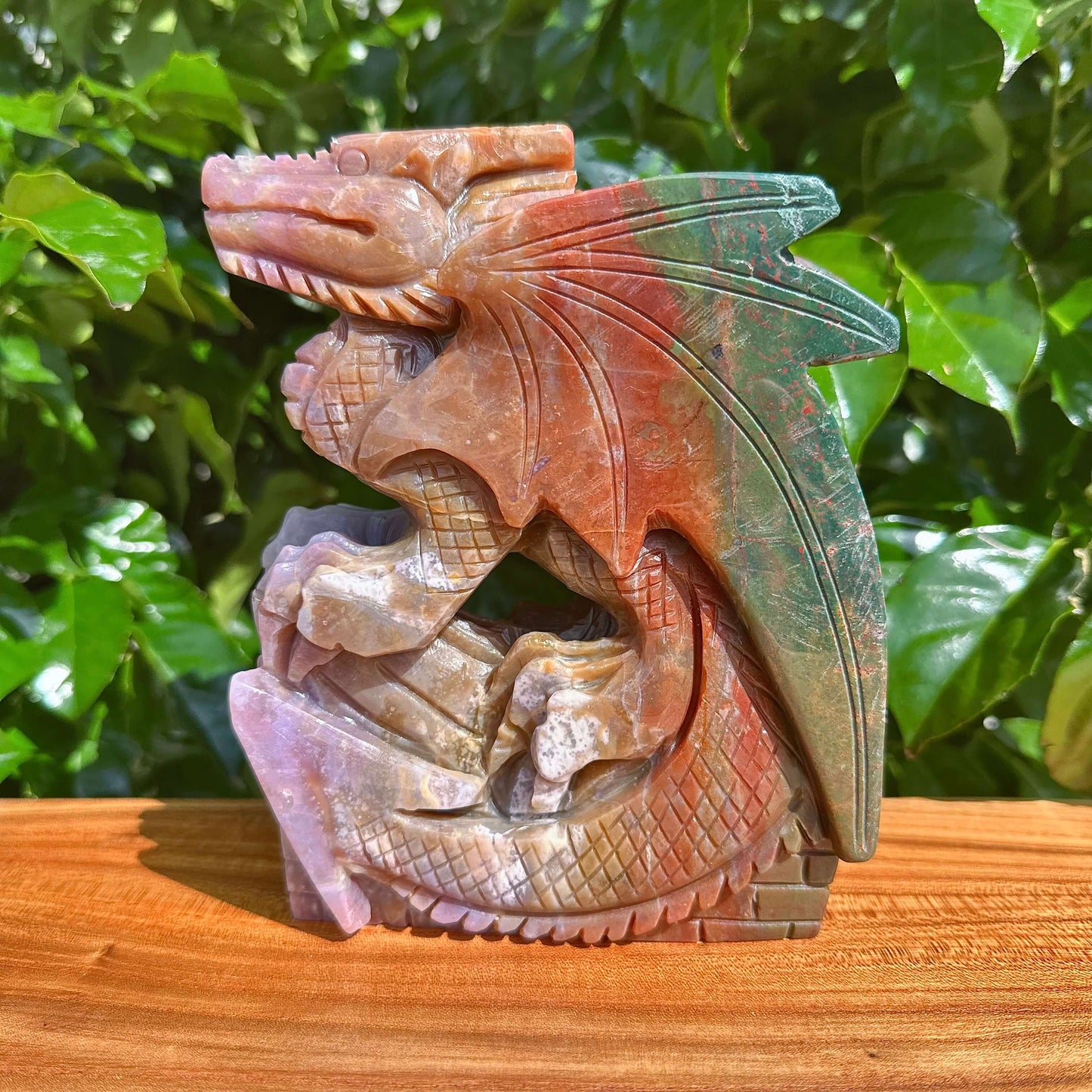 Ocean Jasper Dragon Carving showcasing detailed texture and vibrant hues.