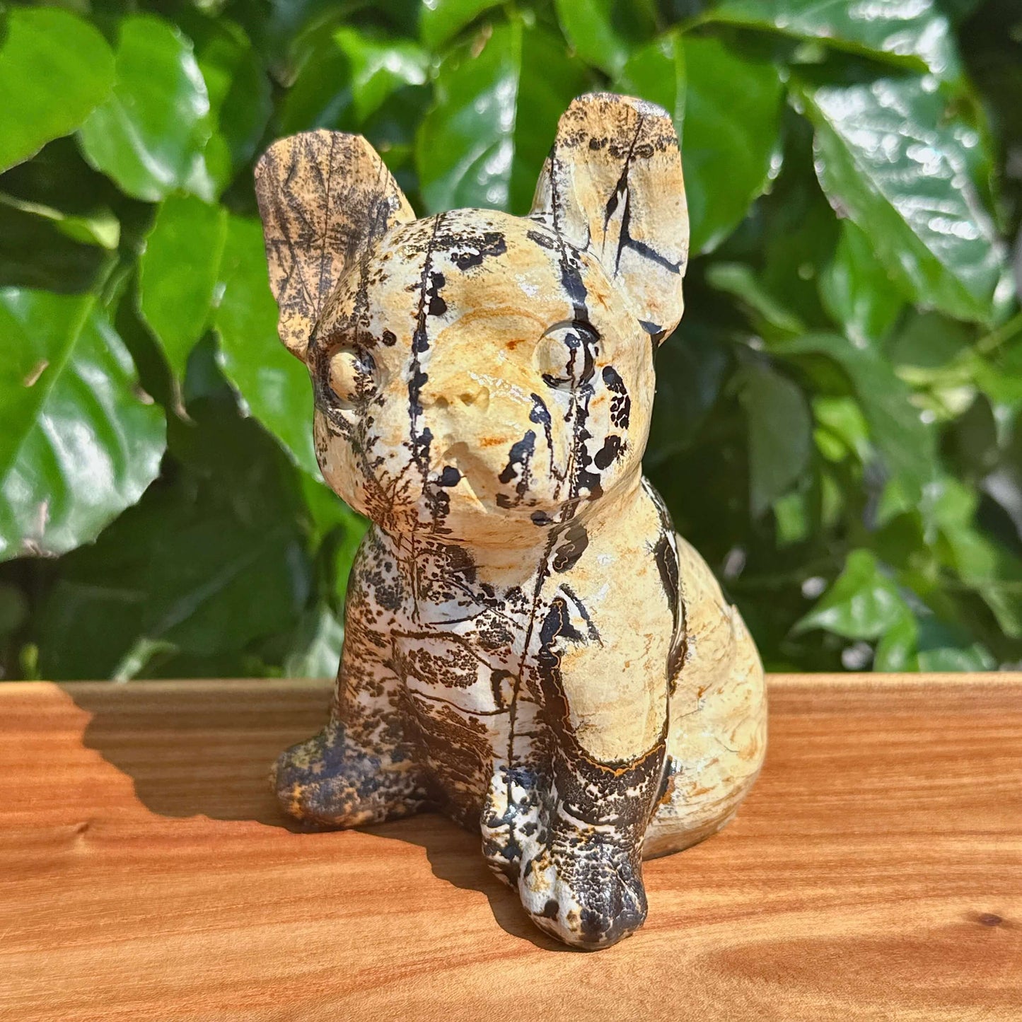 Front view of a detailed Picture Jasper French Bulldog carving.