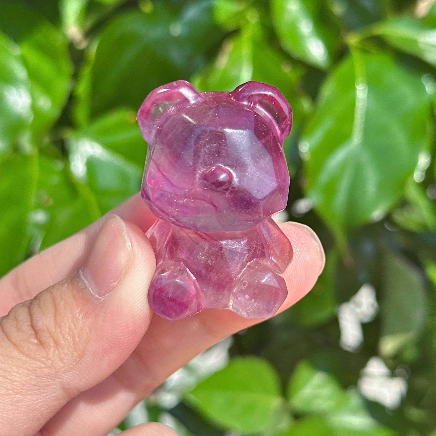 Rainbow Fluorite Bear Carving showing a different angle with brilliant color variations.