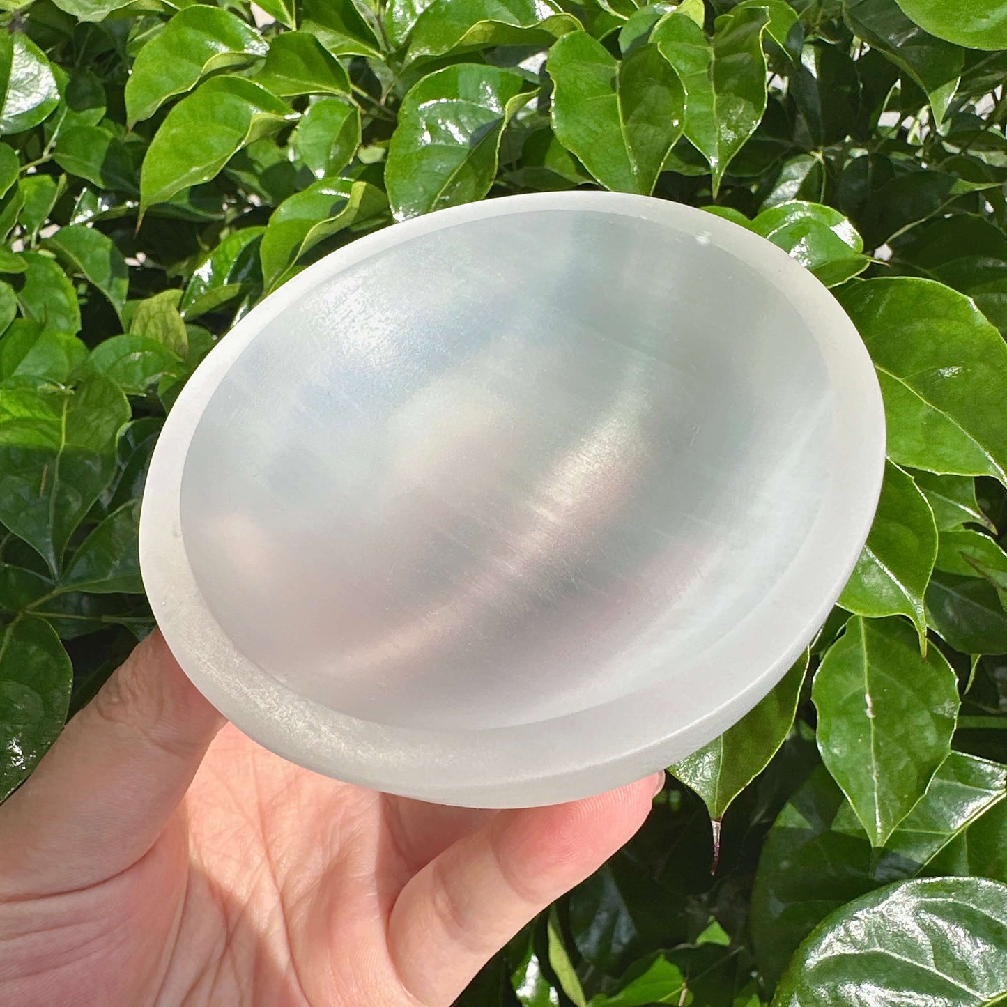 Beautifully polished Selenite Bowl with transparent design, ideal for both practical and decorative uses.
