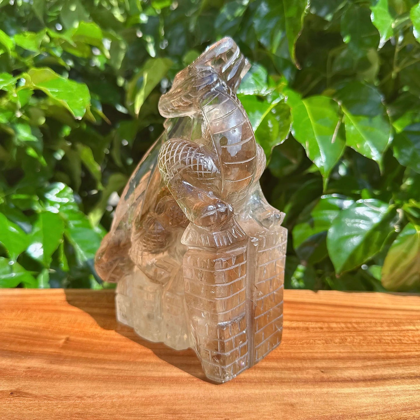 Full view of the Smoky Quartz Dragon Carving with an intricate design and crystal features.