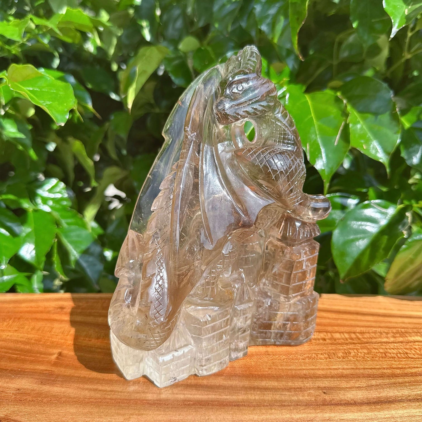 Side profile of Smoky Quartz Dragon Carving with visible tail and wings.