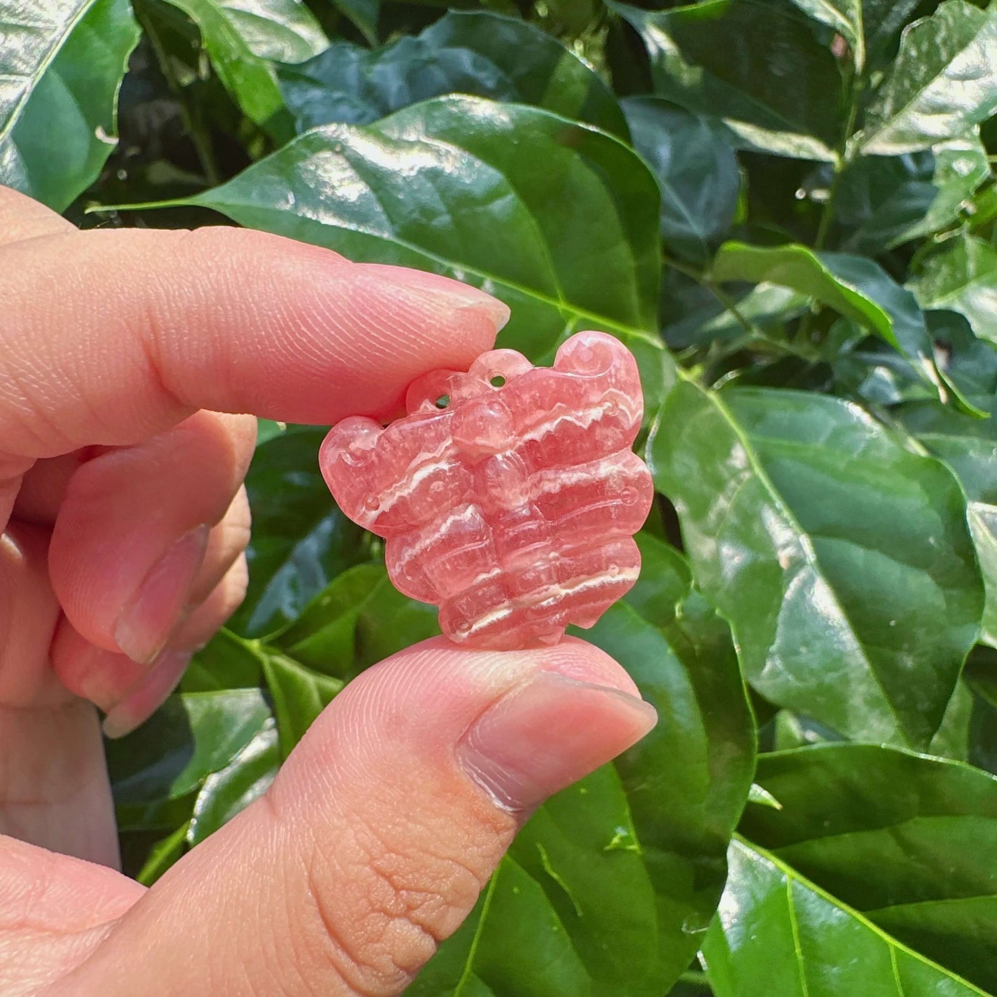 Rhodochrosite Carving