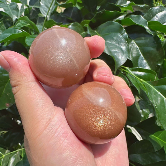 Peach Moonstone With Sunstone Sphere