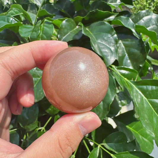 Peach Moonstone With Sunstone Sphere