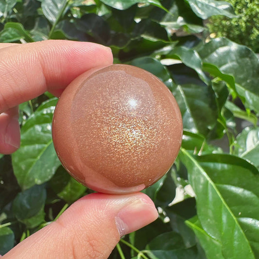 Peach Moonstone With Sunstone Sphere