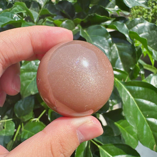 Peach Moonstone With Sunstone Sphere