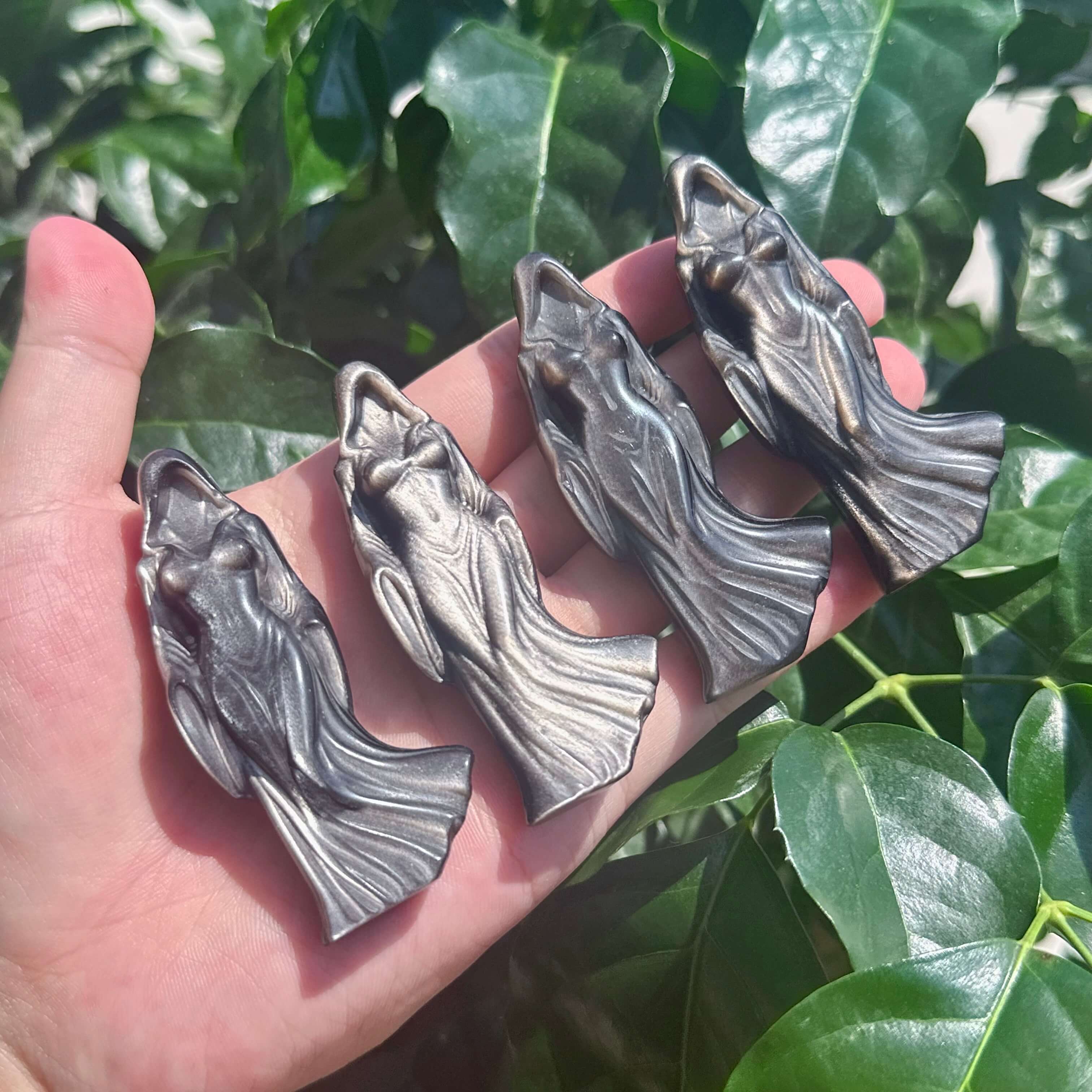 Silver Obsidian Faceless Woman Carving