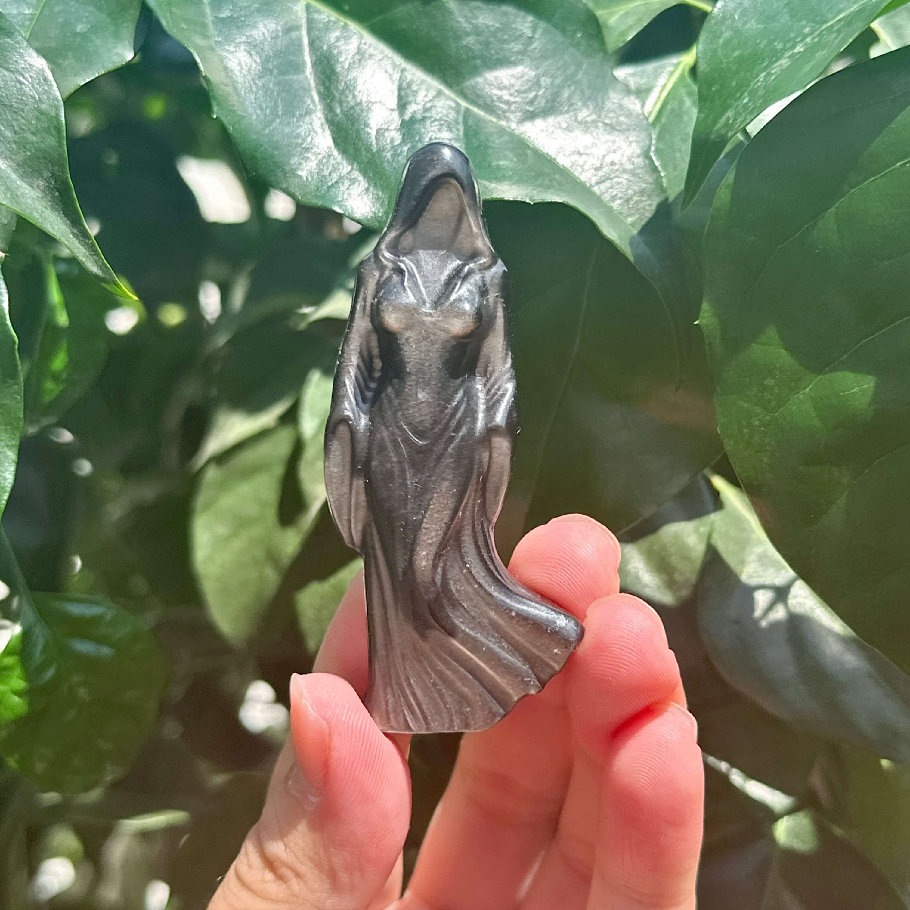 Silver Obsidian Faceless Woman Carving