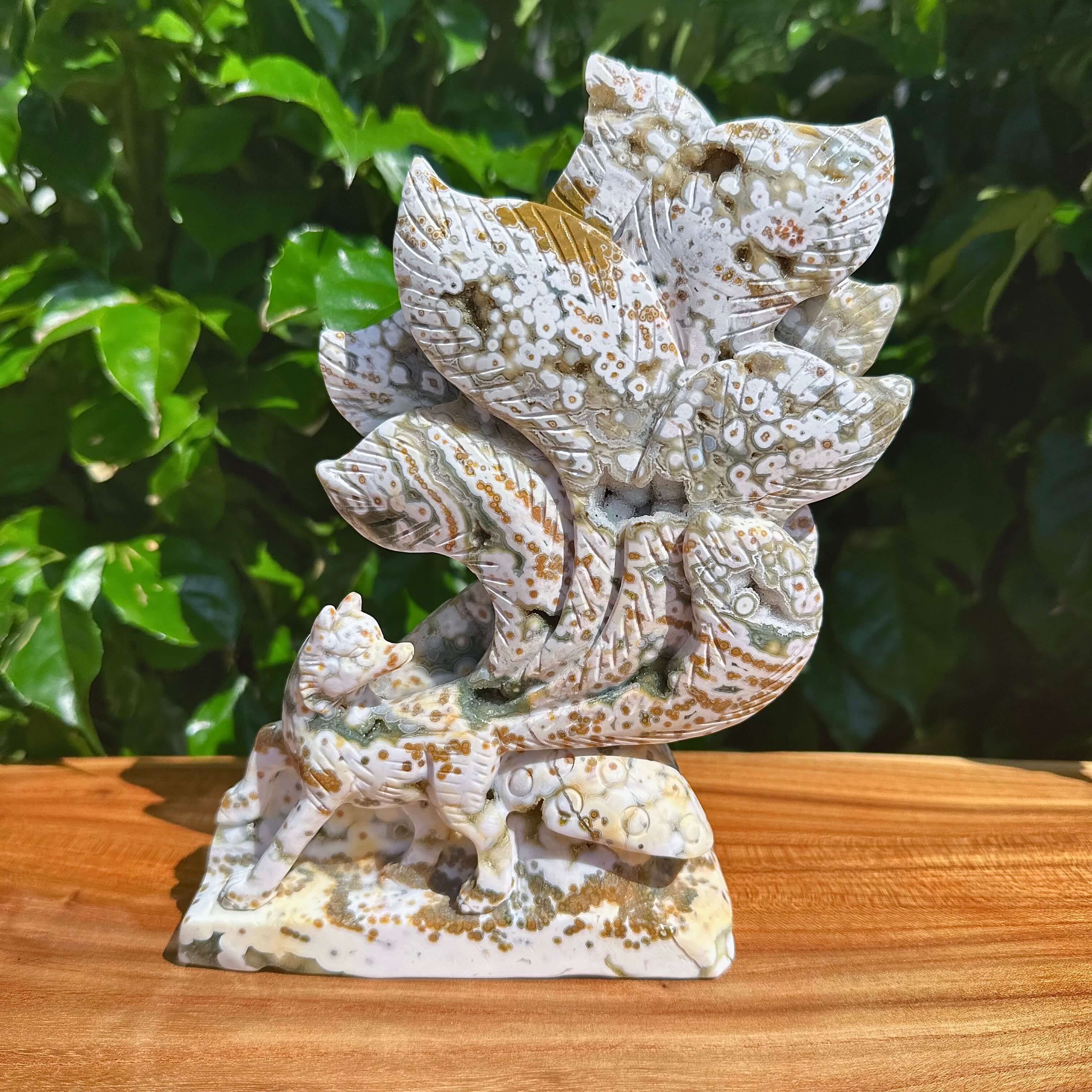 8th Vein Ocean Jasper Nine-Tailed Fox Carving with unique crystal patterns, showcasing fine craftsmanship.