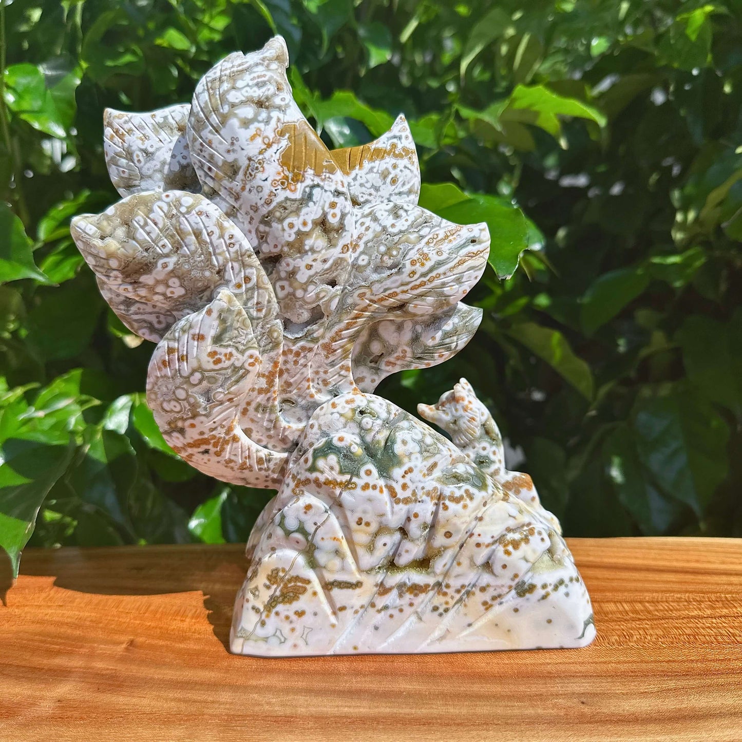 A full view of the 8th Vein Ocean Jasper Nine-Tailed Fox Carving, showcasing the layered design and unique color variations of the stone.