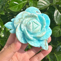 Detailed view of Hemimorphite Rose Carvings, focusing on the realistic petal shaping and vibrant color variations in the crystal.