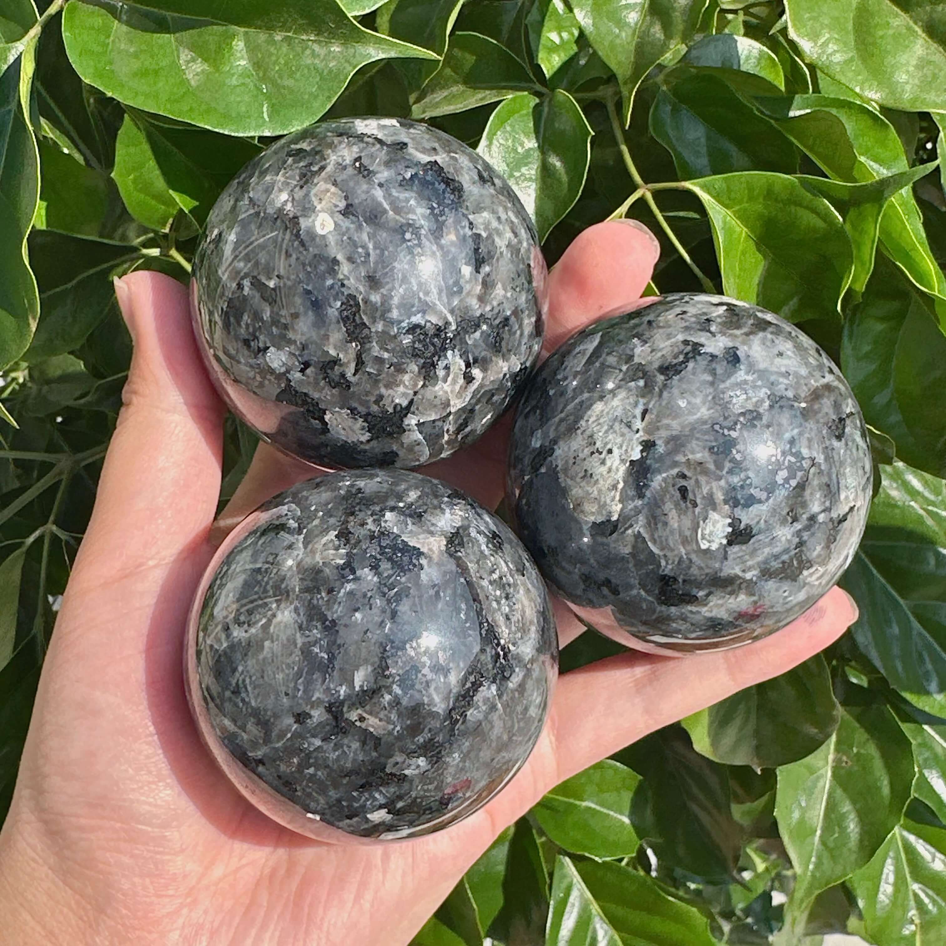 Larvikite Sphere displaying its vibrant natural mineral structure, perfect for those seeking to enhance spiritual energy and promote balance.