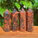 Mahogany Obsidian Tower with distinctive black and reddish patterns, perfect for crystal healing and decor.