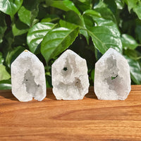 Natural Moroccan Geode Tower with sparkling crystal interior.