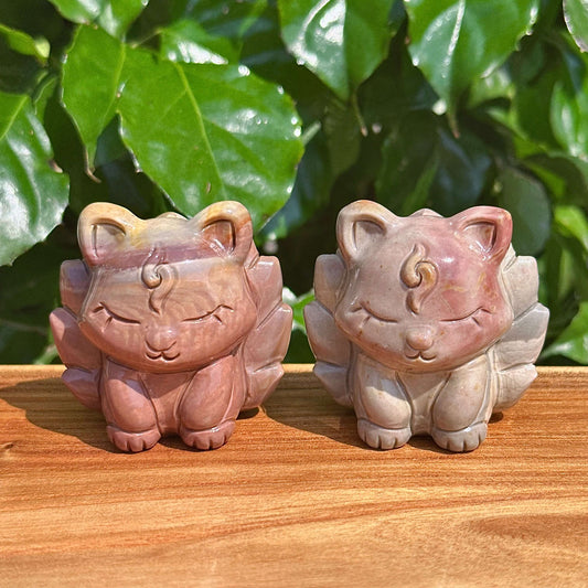 Close-up view of Alashan Agate Nine-Tailed Fox Carving with natural agate details, showcasing intricate craftsmanship.