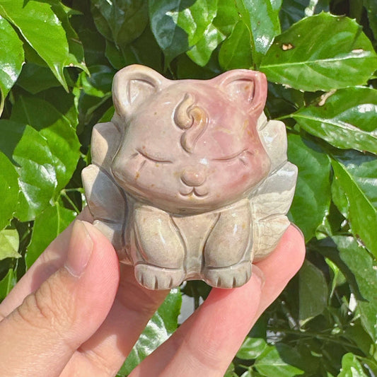 Alashan Agate Nine-Tailed Fox sculpture featuring exquisite craftsmanship and detailed agate texture.