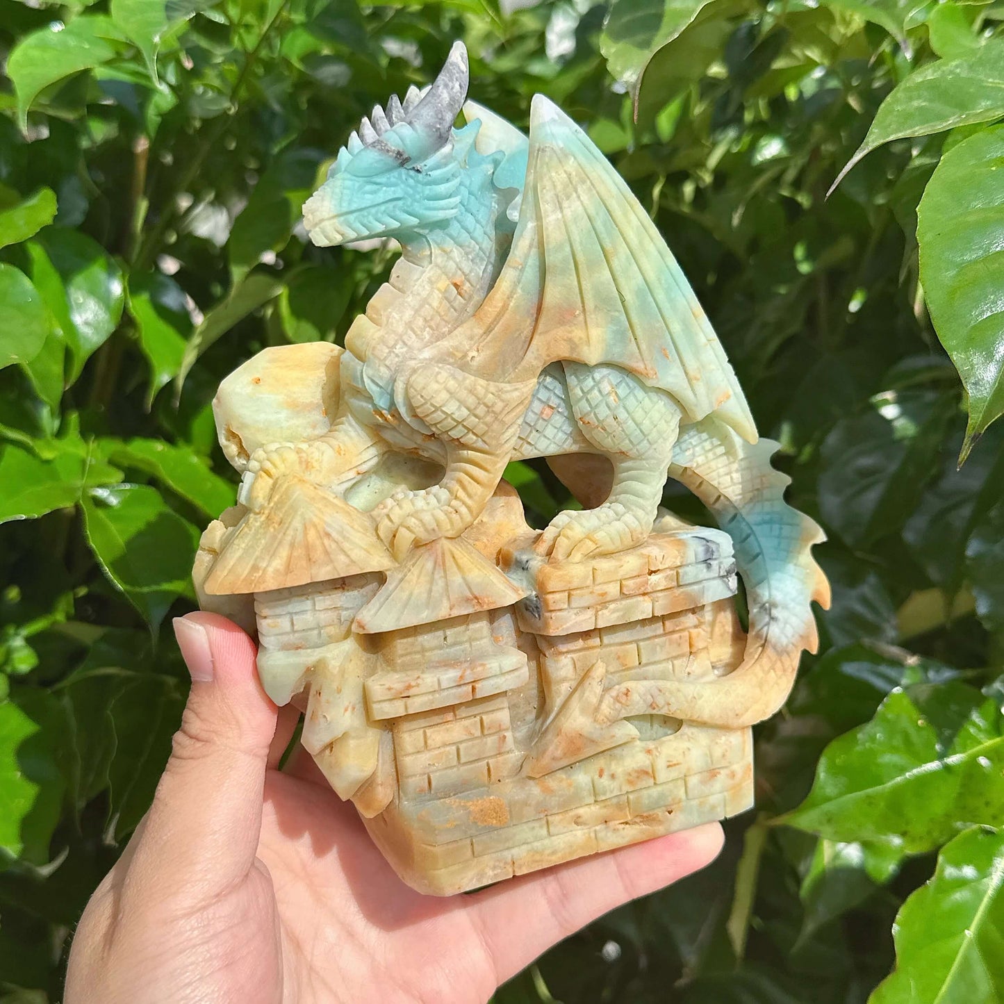 Amazonite Dragon Carving viewed from the side, showcasing its dynamic and detailed design.
