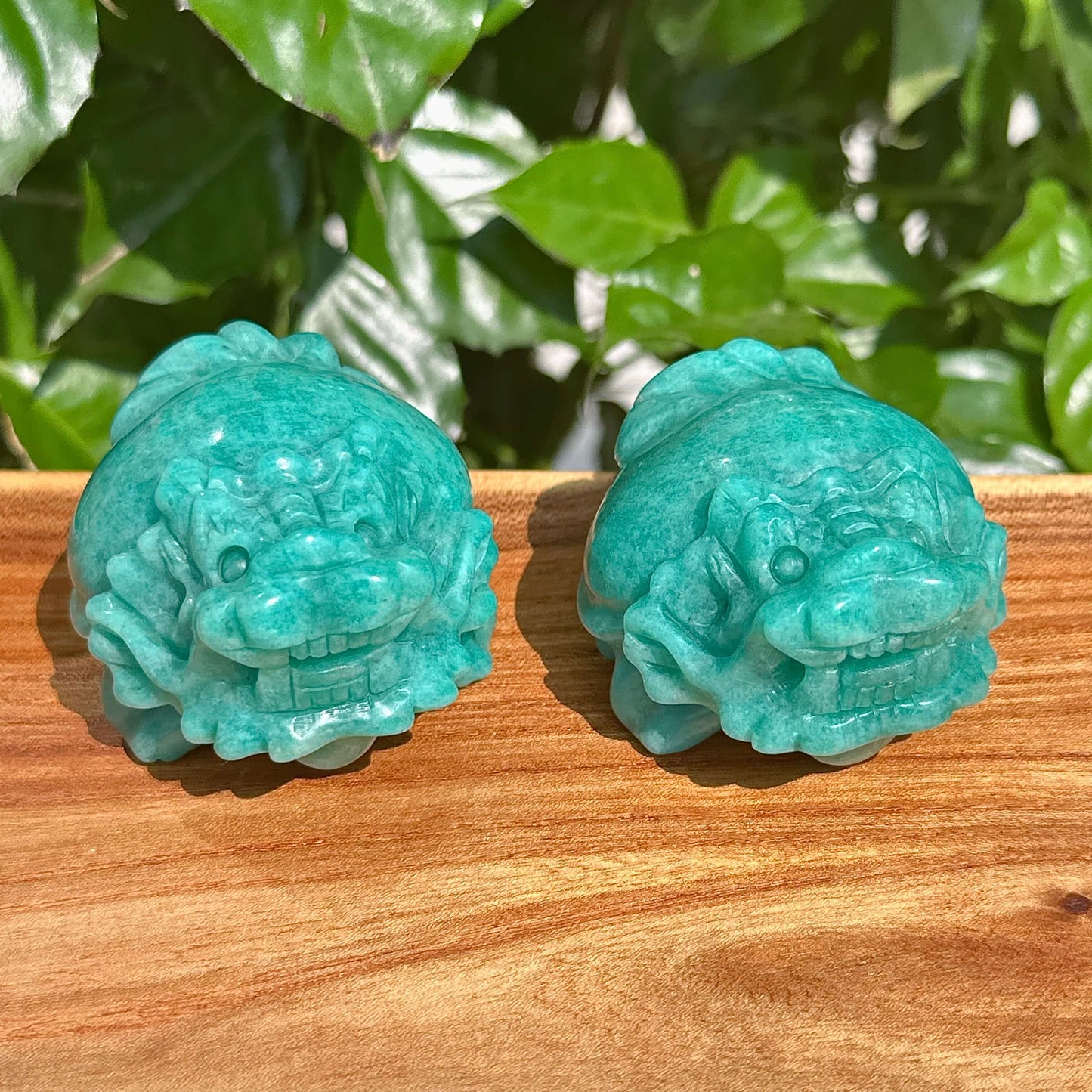 The Amazonite Dragon Turtle Carving in natural lighting, emphasizing the fine details.