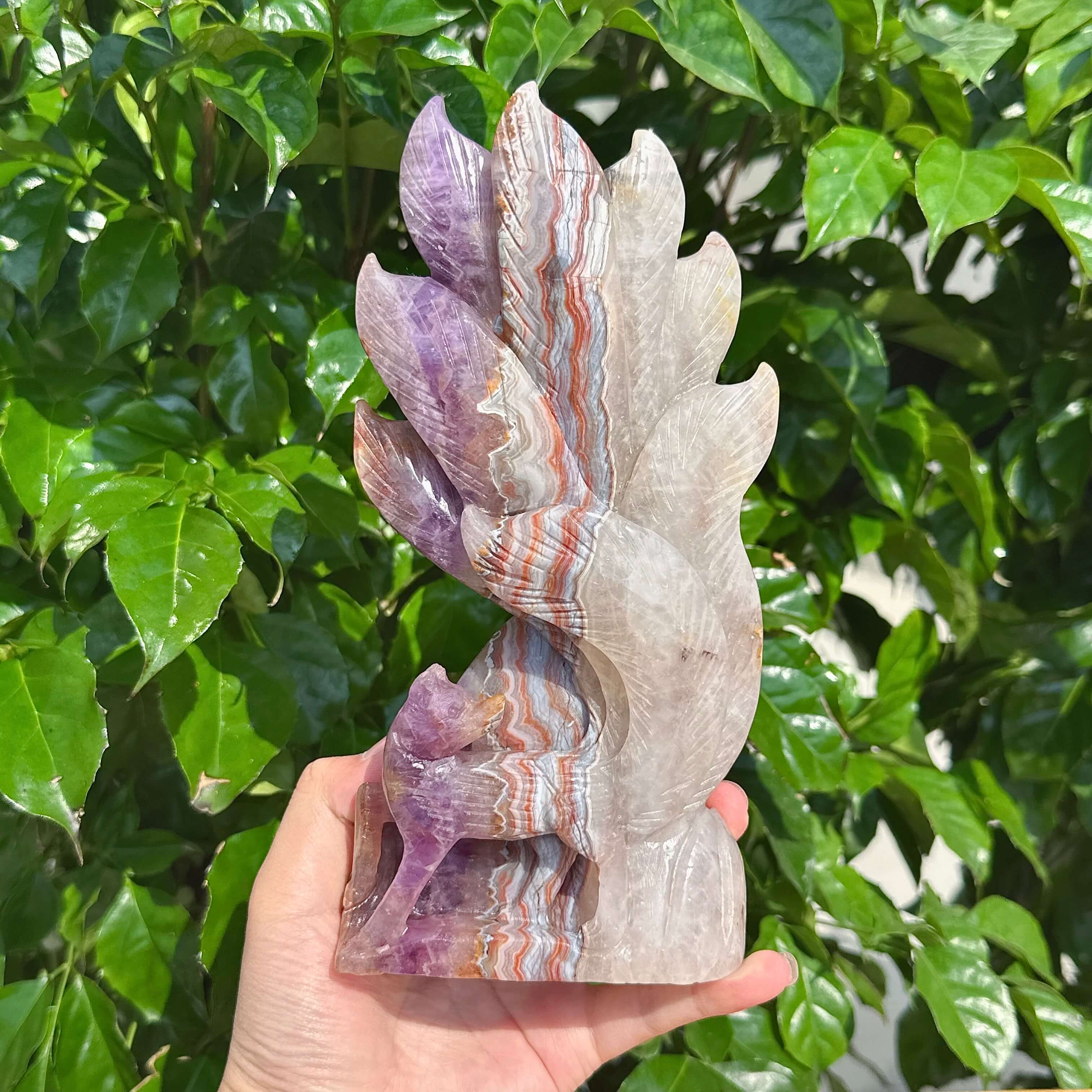Detailed view of the Amethyst Agate Nine-Tailed Fox Carving, highlighting the intricate design and color variations.
