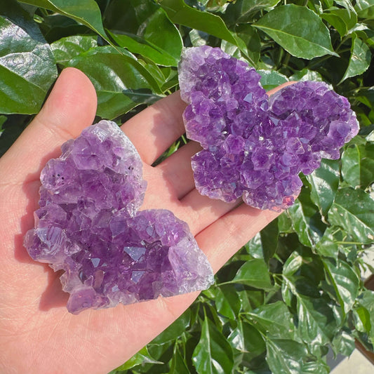 Detailed view of Amethyst Cluster Butterfly, emphasizing the richness and clarity of the amethyst crystals.