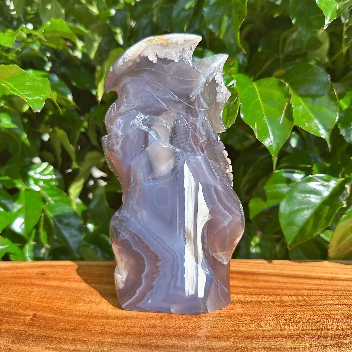 Black Flower Agate Dragon Sculpture - Side view showcasing the intricate dragon wings and textures