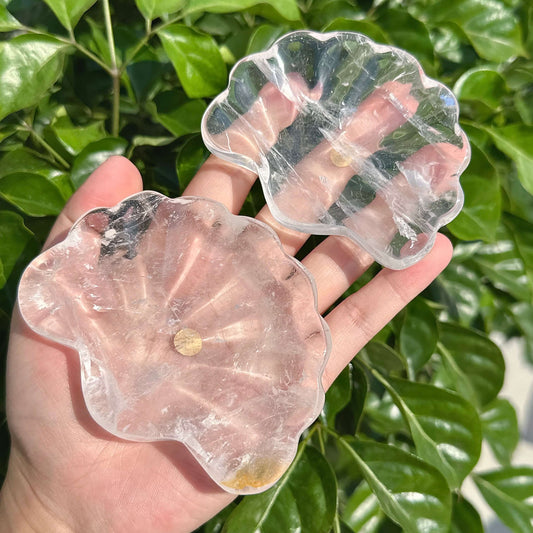Clear Quartz Shell Bowl with translucent crystal surface showcasing natural patterns.