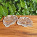 Pair of Clear Quartz Shell Bowls showcasing their sparkling transparency and fine details.