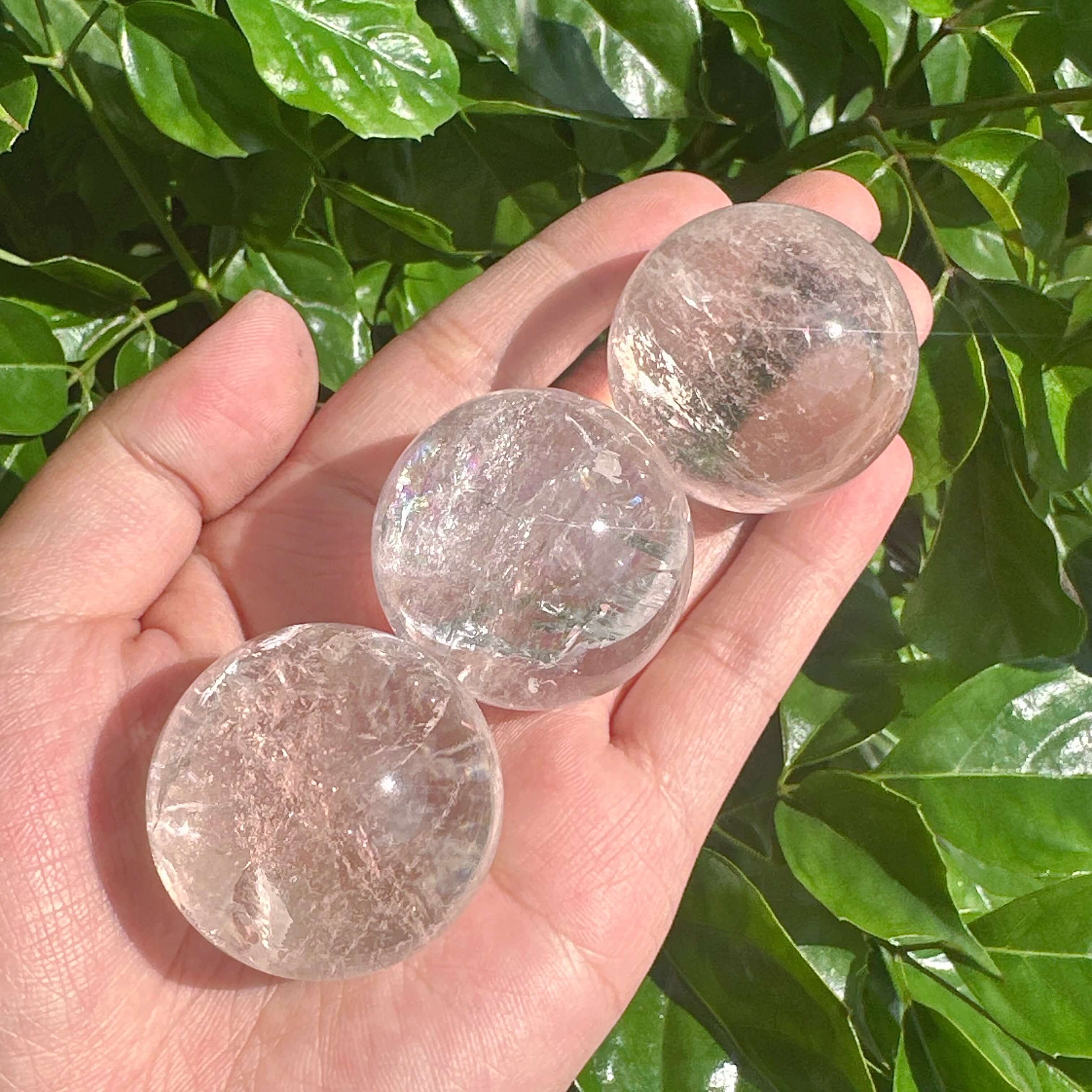 Close-up of Clear Quartz Sphere highlighting its crystalline structure and natural shine, symbolizing clarity and positive energy.