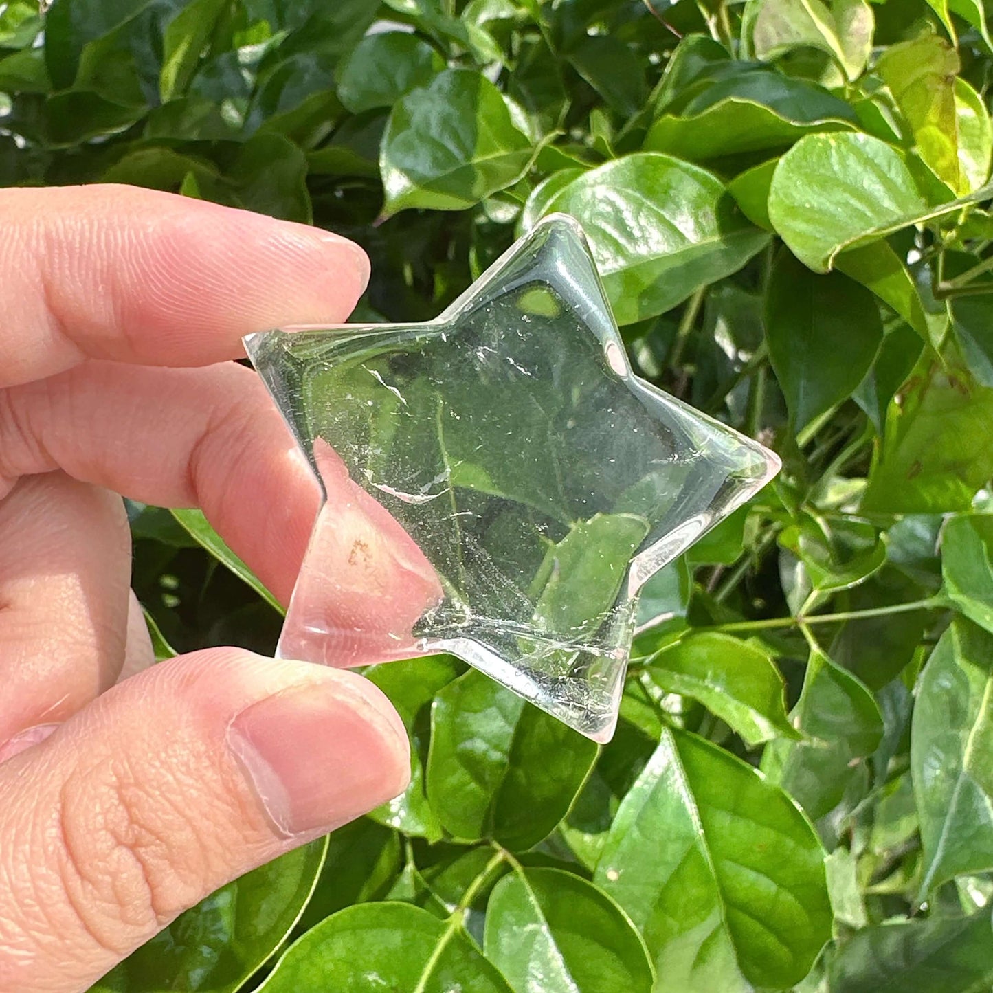Elegant Clear Quartz Star Carving with flawless transparency