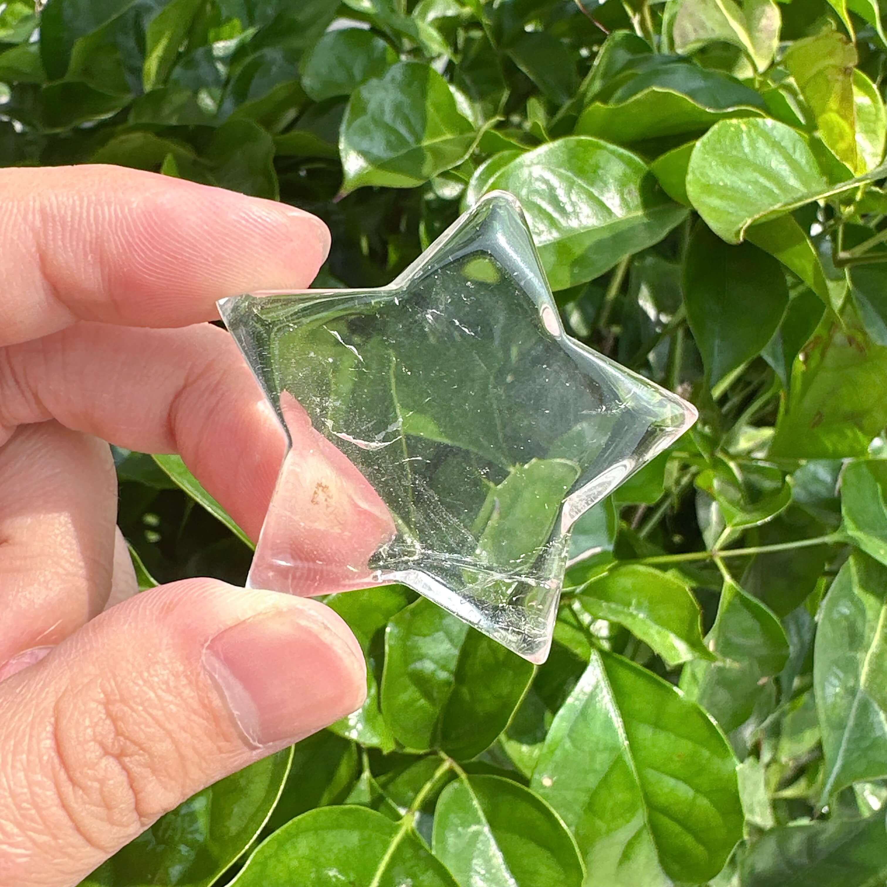 Elegant Clear Quartz Star Carving with flawless transparency