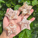 Flower Agate star carving featuring natural formations and soothing colors