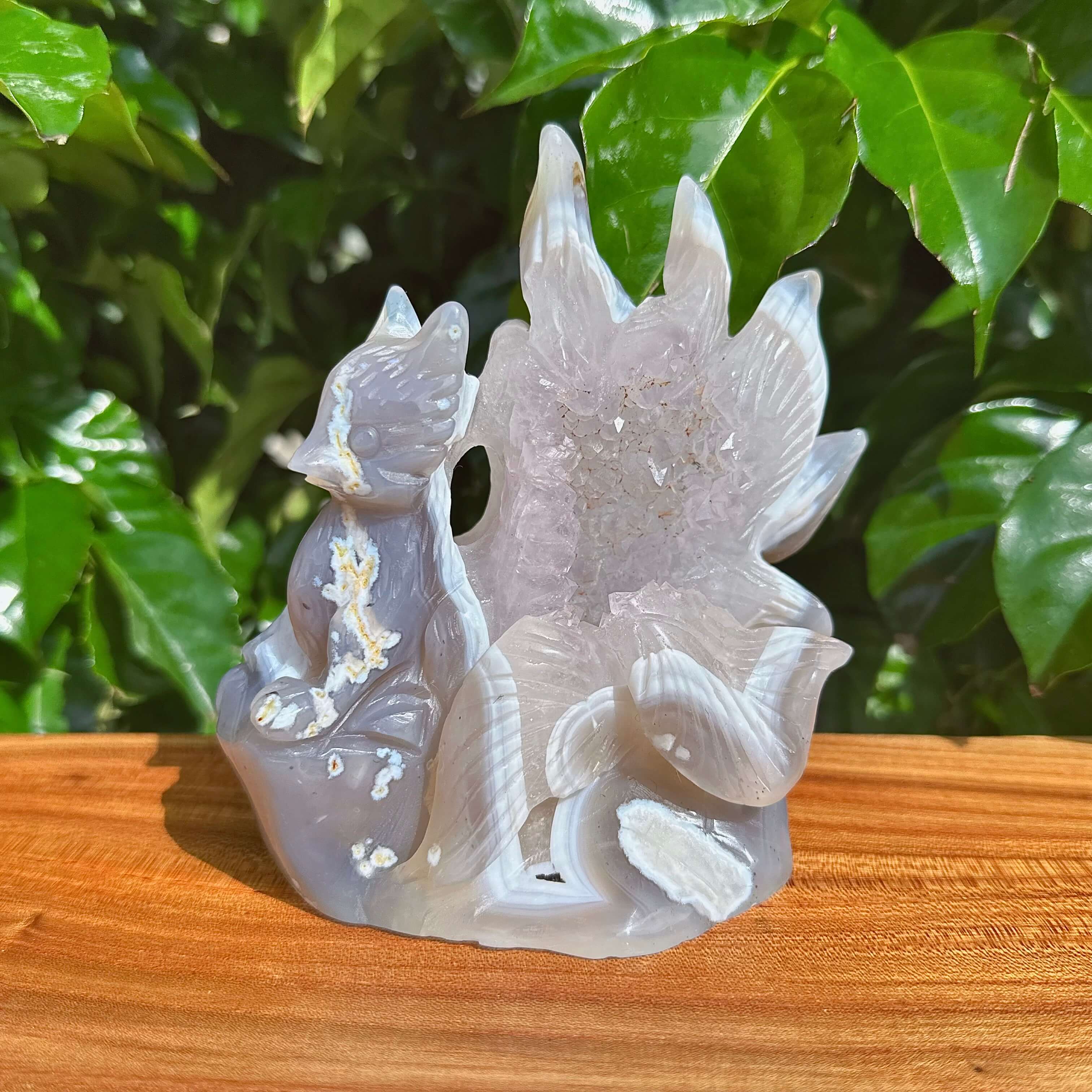 Handcrafted Geode Agate Nine-Tailed Fox Carving showcasing fine crystal detailing with subtle colors and textures.