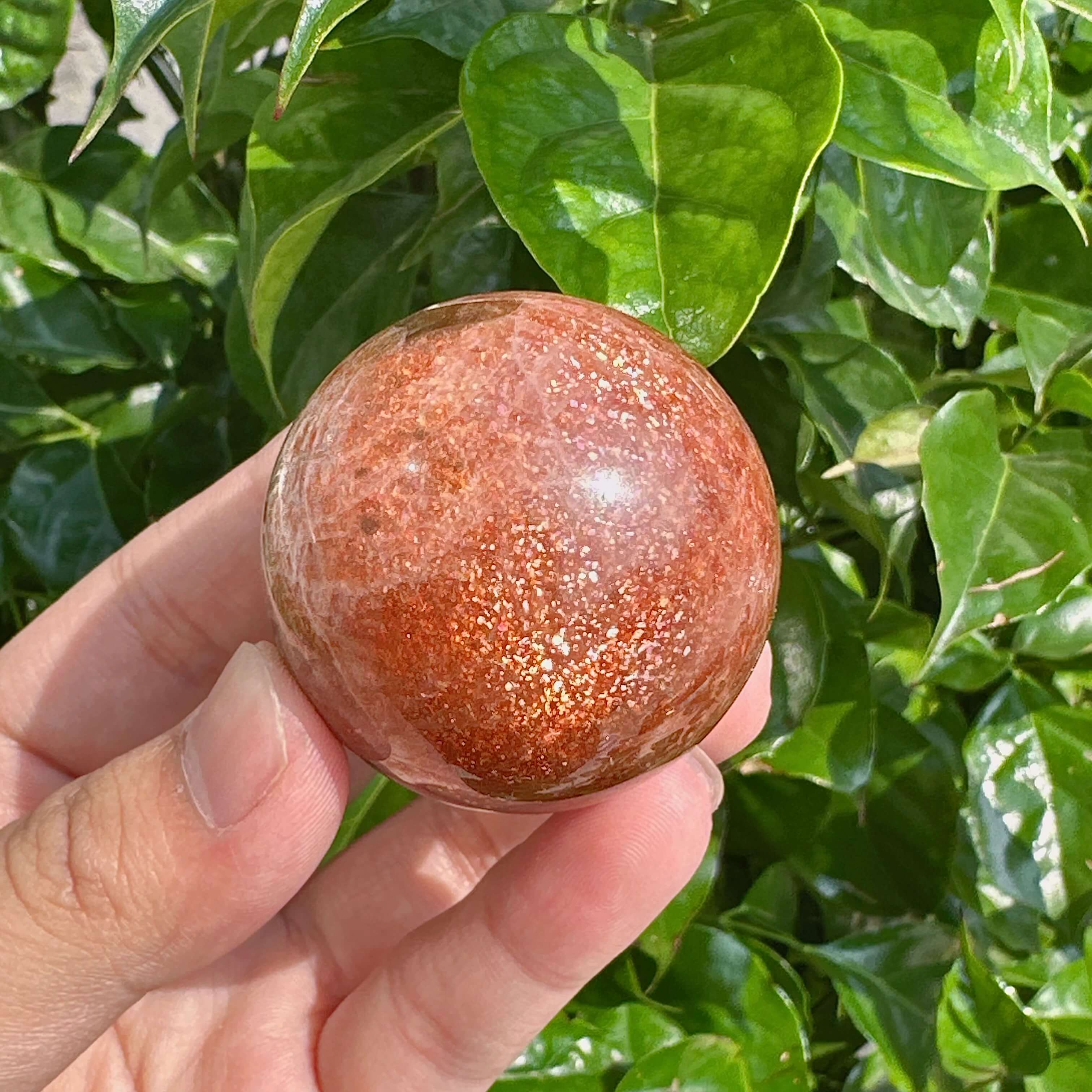 High-quality Golden Sunstone Sphere with smooth, polished surface, perfect for energy healing.