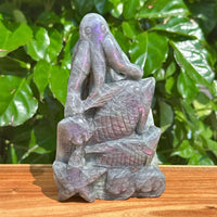 Labradorite octopus carving with detailed texture and intricate design.