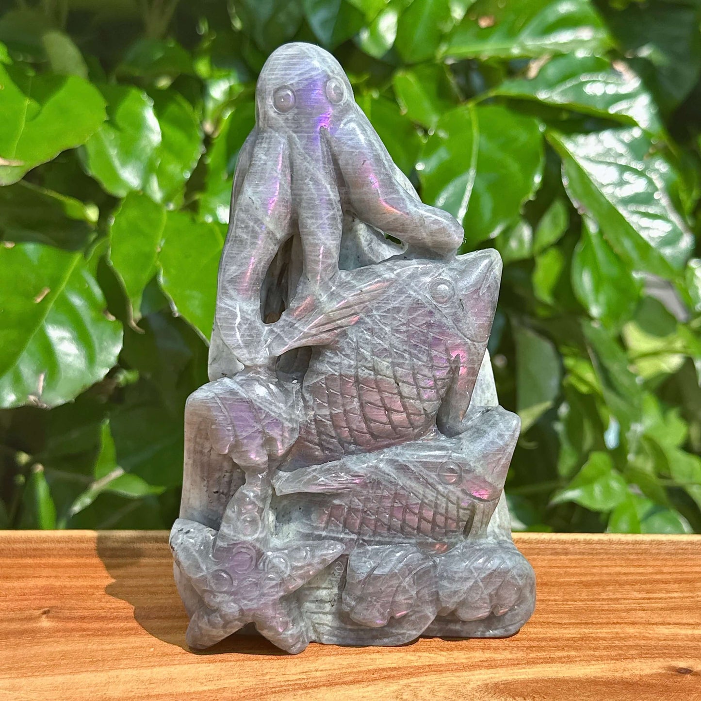Labradorite octopus carving with detailed texture and intricate design.