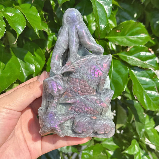 Close-up of the Labradorite octopus sculpture showcasing its unique gemstone reflections.
