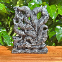 Larvikaite Nine-Tailed Fox Carving showcasing intricate details with graceful flowing tails.